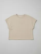 Musculosa oversize de algodón con cuello redondo y detalle de bordado floral en el centro del pecho.