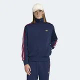 Campera deportiva Adidas Firebird azul marino con cuello alto, cierre frontal, bolsillos con cremallera y logo dorado bordado en el pecho. Presenta las tres líneas características de la marca en blanco y rojo a lo largo de las mangas.