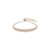 Pulsera bañada en tono oro rosa con cristales de talla redonda en Vintage Rose, engastados en bisel sobre una cadena flexible. Tiene cierre deslizante.