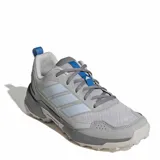 Championes Adidas Terrex Eastrail 3 de mujer, diseñados para trekking y senderismo, en color gris con detalles en celeste y azul. Capellada de malla transpirable con refuerzos sintéticos, mediasuela de EVA y suela Traxion de gran agarre.