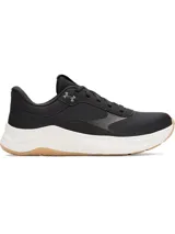 Championes de entrenamiento Under Armour modelo W Aurora 3, diseñados específicamente para el pie femenino. Presentan una parte superior de malla transpirable en color negro con detalles de gamuza, mediasuela blanca con amortiguación Charged+ y suela de goma color caramelo con patrón de tracción multidireccional.