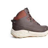 Bota de trekking Hi-Tec de caña media, confeccionada en cuero sintético y malla técnica. Presenta un diseño impermeable con entresuela Geo Foam para mayor amortiguación y suela de caucho MD Traction para un agarre superior en terrenos difíciles.
