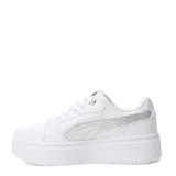 Championes Puma modelo Rebound Low con plataforma, color blanco con detalle de logo lateral en plateado metalizado. Diseño de caña baja con cordones y suela de goma gruesa.