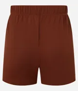 Short corto blanco de crepé con cintura elástica, cordón ajustable con punteras doradas y ruedo redondeado, diseñado como salida de playa por Bossa Nossa.