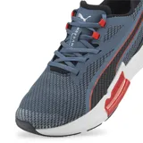 Championes Puma modelo Pwr Frame TR, color gris y azul, con detalles en negro y rojo, diseñados para running y training.