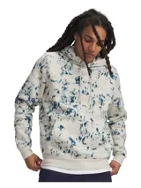Buzo con capucha Under Armour, confeccionado en tejido polar de mezcla de algodón con interior cepillado. Presenta un estampado tipo tie-dye en tonos azul y blanco, bolsillo canguro delantero, puños y bajo acanalados, y logotipo de la marca bordado en el pecho.