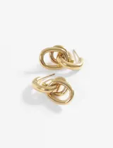 Caravanas de acero quirúrgico hipoalergénico con diseño de aros entrelazados colgantes en acabado plateado.