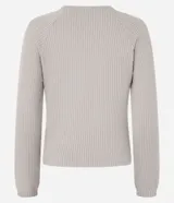 Blusa slim de tejido acanalado con cuello redondo y mangas largas con sisa raglán. Presenta una textura suave y diseño liso.