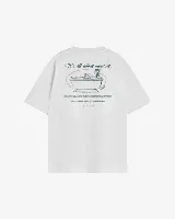 Remera blanca de algodón con estampado en la espalda de una persona en una bañera y la frase "It's all about mindset".