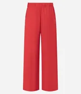 Pantalón wide leg de sastrería color rojo, con cintura alta, elástico en la parte posterior y cierre lateral.