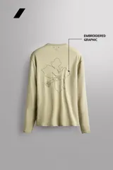 Remera manga larga Zara Athleticz de color beige, con cuello redondo y costuras visibles en los hombros.