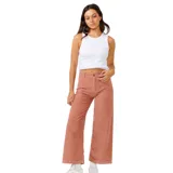 Pantalón de pana color salmón, de corte ancho y tiro alto.