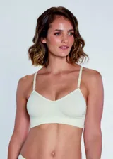 Soutien tipo top de microfibra sin costuras, sin aros ni copas, con breteles regulables.