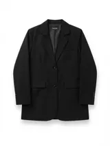 Blazer oversize negro de corte estructurado con solapa clásica, hombros marcados, mangas largas y cierre frontal de un botón.
