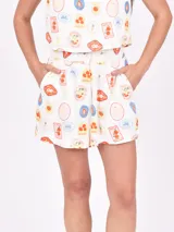 Short de tiro alto con estampado de frutas y sellos.
