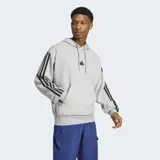 Canguro Adidas gris con capucha, cordón ajustable, bolsillo tipo canguro, hombros caídos, puños y dobladillo acanalados, dobladillo trasero ligeramente más corto y las icónicas tres rayas negras en las mangas.