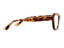 Lentes con armazón cuadrado de diseño inspirados en los años 70, con estampa carey en tonos marrones y caramelo, y cristales transparentes con protección contra luz azul y UV400.