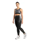 Calza deportiva negra con estampado abstracto en gris y blanco en laterales y cintura.