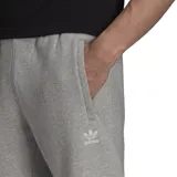 Pantalón de jogging gris con cintura elástica y logo de Adidas bordado en blanco en la pierna izquierda.