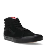 Championes de caña alta Vans modelo Sk8-Hi, color negro, confeccionados en una combinación de gamuza y lona. Presentan el diseño icónico de la marca con la banda lateral característica, suela de goma tipo waffle y etiqueta con logo en la lengüeta.