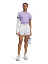 Remera deportiva de entrenamiento Under Armour, color lila, con diseño de ajuste cruzado en la cintura y cuello redondo. Confeccionada con tecnología UA RUSH™ que refleja la energía corporal, tejido elástico en cuatro direcciones y propiedades de secado rápido.
