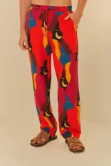 Pantalón estampado de corte relajado, confeccionado en mezcla de lino y viscosa, con cintura elástica y cordón ajustable.