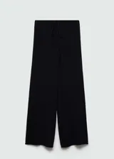 Pantalon de punto crochet color negro, con diseño recto, largo y cintura elástica con cordón ajustable.