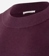 Buzo suéter de tricot con cuello redondo y puños ajustados, de diseño clásico y versátil.