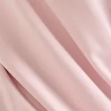 Canguro rosa de algodón con capucha y logo de New Balance estampado en el pecho.