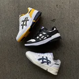 Championes Asics modelo EX89, de diseño retro inspirado en el básquetbol, con combinación de colores blanco y negro. Presentan una estructura de cuero con perforaciones en la puntera, cordones al tono y suela de goma resistente.