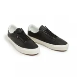 Championes Vans Old Skool Lux de cuero negro con detalles en blanco en el talón y suela de goma vulcanizada.