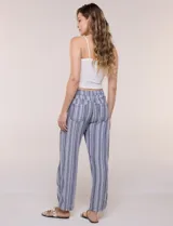 Pantalón de lino blanco, marca Dash, con pretina ancha elastizada, lazo de ajuste y bolsillos inclinados en el frente.
