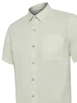 Camisa de manga corta color verde claro, confeccionada en lino orgánico. Presenta cuello camisero, cierre frontal de botones, bolsillo aplicado en el pecho con detalle bordado y dobladillo redondeado.