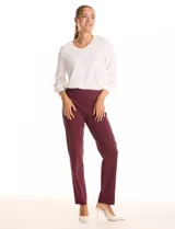 Pantalón sastrero de corte recto y entallado, con nervadura central vertical que estiliza la silueta. Cuenta con cintura ancha de soporte, panel de malla interna para control abdominal y bolsillos posteriores simulados.