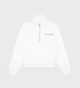 Buzo blanco de algodón con medio cierre frontal, cuello polo, corte ligeramente oversize, largo corto y dos bolsillos laterales. Estampado frontal con el logo de la marca Sporty & Rich en color verde.