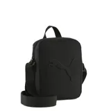 Bandolera Puma color negro con logo de la marca grabado en relieve en el frente. Cuenta con cierre principal, asa de mano superior y correa ajustable para el hombro.