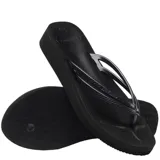 Sandalias tipo ojotas Havaianas en color negro, con diseño de tiras finas texturizadas y suela de goma antideslizante.