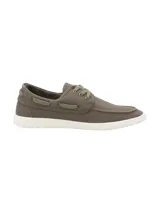 Zapatillas de lona para hombre estilo náutico, color verde militar, con cordones y suela blanca de goma.