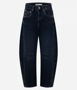 Pantalón de jean estilo baggy balloon, de tiro medio y corte amplio con diseño redondeado en las piernas. Presenta recortes laterales, cierre frontal con botón y cremallera, y bolsillos funcionales.