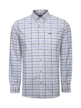 Camisa de manga larga confeccionada en franela de algodón orgánico, con diseño de cuadros en tonos blancos, azules y negros. Presenta cuello con botones, cierre frontal abotonado, bolsillo en el pecho y logo bordado.