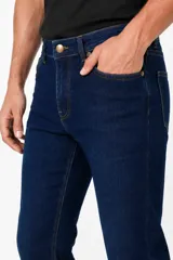Pantalón jean skinny de tiro bajo y color azul medio.