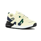 Championes urbanos Austral modelo Bariloche, color beige con detalles en azul marino y verde. Presentan capellada de malla y sintético, cordones bicolor y suela chunky con entresuela blanca y negra.