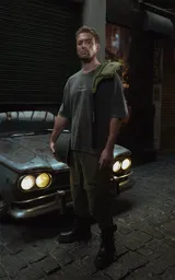 Remera negra con efecto nevado/acid wash, corte oversize, con estampado gráfico en la espalda inspirado en la película 'Bastardos sin gloria' de Tarantino, mostrando personajes con armas y dinamitas.