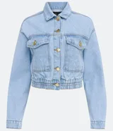 Campera cropped de jean celeste con escote solapa, manga larga, bolsillos delanteros y elástico en el bajo.