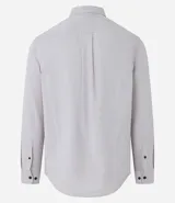 Camisa verde militar de manga larga en sarga de algodón, con cuello clásico, cierre frontal abotonado y dos bolsillos con solapa abotonada en el pecho.