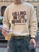 Buzo color beige con estampado frontal en marrón con la frase "Killing in the Name of", cuello redondo, mangas largas y puños y cintura de rib.