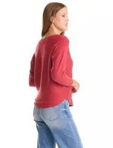 Buzo de punto rib con diseño de manga japonesa en largo tres cuartos y silueta relajada.