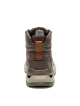 Bota de senderismo Caterpillar modelo Surge Hiker, confeccionada en nubuck encerado y malla de nailon. Presenta un diseño robusto con entresuela de EVA, suela de goma con tecnología SRX para resistencia al deslizamiento y sistema de amortiguación reactiva.