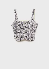 Top entallado de lino y viscosa con estampado floral, cuello cuadrado, tirantes anchos y cierre frontal con botones.