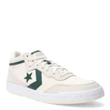 Championes Converse Fastbreak Pro color crema con detalles en verde oscuro. Confeccionados en cuero y nailon, con suela de goma blanca y logo Star Chevron verde en el lateral.